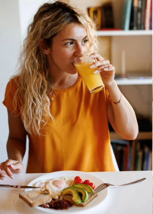 mixed race lady eating nutritious meal in alaska