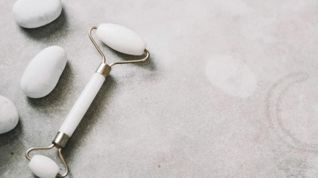 white spa roller and stones for relaxation